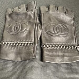 CHANEL Black Leather Chain Detail Fingerless Gloves. Includes Box / Shopping Bag